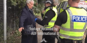 Pro-Life Grandma Arrested for Silently Holding Sign Outside Abortion Center