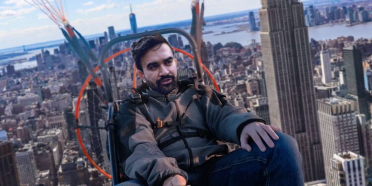 Image for article: In Honor Of October 7, Mamdani Paraglides Into Campaign Event