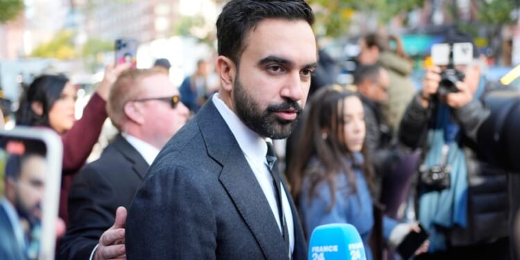 Mamdami Nailed for Photo With Terror Apologist, Making Relative a Victim of 9/11 Attack