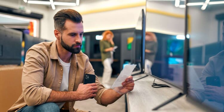 Image for article: Sad: Man Who Missed Black Friday Forced To Buy TV For Same Price But Without Giant 'BLACK FRIDAY SALE' Tag