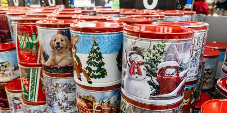 Image for article: Meaning Of Christmas Revealed To Actually Be Those Popcorn Tins With The Three Types Of Popcorn