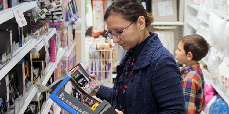Image for article: Mom Scours Toy Aisle In Search Of Perfect Christmas Present For Child To Break In Four Seconds