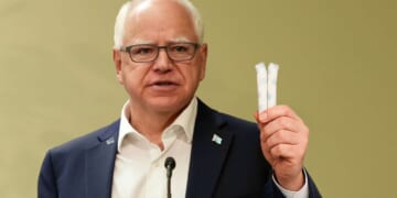 Image for article: Tim Walz Offers Journalists Free Tampons To Stop Talking About Fraud Scandal