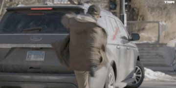 Man Who Appears to Be Alex Pretti Spits at ICE, Kicks Out Tail Light: Report