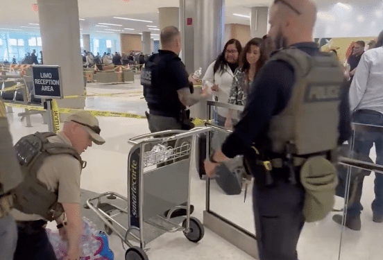 OH, THE HORROR! ICE Agents Hand Out Waters, Tell Folks to Have a Safe Flight at Houston Airport [WATCH]