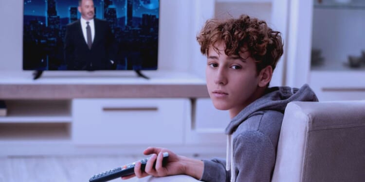 Image for article: Parents Punish Teen By Forcing Him To Stay Up To Watch Jimmy Kimmel Monologue