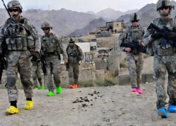 Image for article: Soldiers Issued Crocs So Trump Can Say He Didn't Put Boots On The Ground