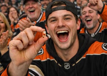 Image for article: Lucky Hockey Fan Catches Foul Tooth