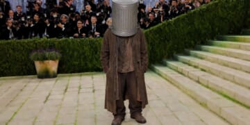 Image for article: Hobo With Garbage Can Stuck On His Head Mistaken For Met Gala Attendee