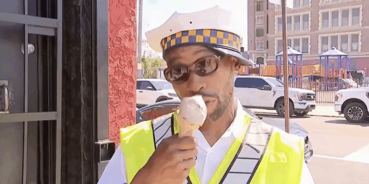 Philadelphia crossing guard goes viral after rescuing child from crash while calmly eating ice cream on TV