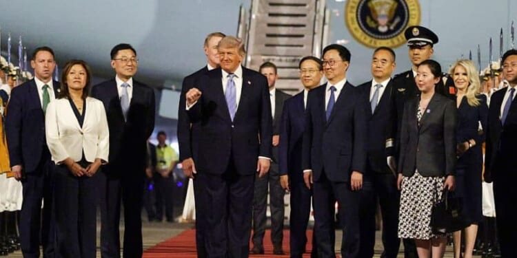 President Trump arrives in Beijing for high-stakes summit with Xi Jinping