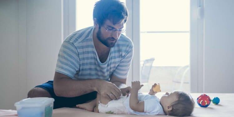 Image for article: 'Feminism Was A Mistake,' Thinks Man Immediately After Starting To Change Baby's Diaper