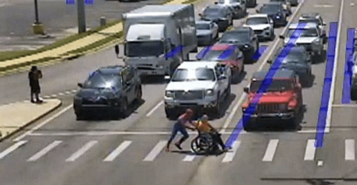 Arkansas Spider-Man Helps Wheelchair User Cross Road