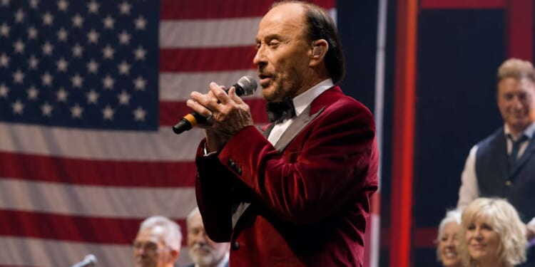 Image for article: Freedom 250 Now Just Lee Greenwood Singing ‘God Bless The USA’ For 24 Hours Straight