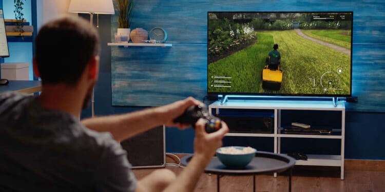 Image for article: Man Informs Wife He Can't Mow The Lawn Today As He Is Busy Playing Lawn Mowing Simulator