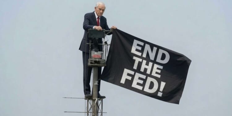 Image for article: Ron Paul Scales Empire State Building To Unveil Flag Reading 'End The Fed!'