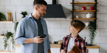 Image for article: Dad Tells Son He Can't Play Catch Right Now As He's Busy Owning Some Loser On The Internet