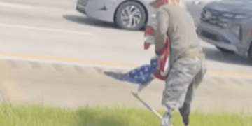 Double-Amputee Marine Rescues American Flag From Highway
