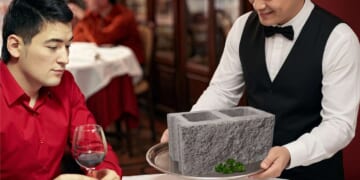Image for article: 'It's Fine,' Says Introvert Who Ordered Mashed Potatoes And Instead Received A Concrete Cinder Block