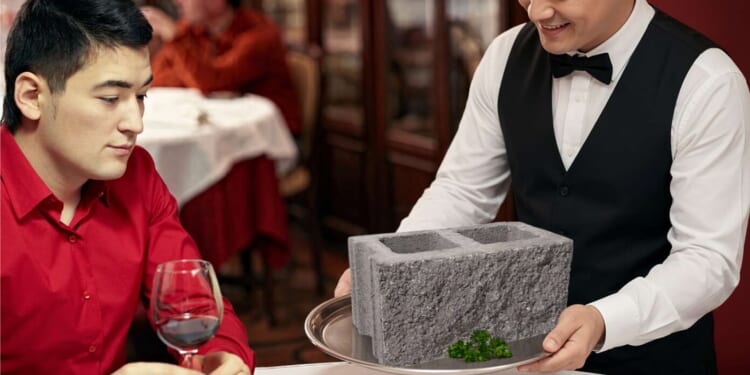 Image for article: 'It's Fine,' Says Introvert Who Ordered Mashed Potatoes And Instead Received A Concrete Cinder Block