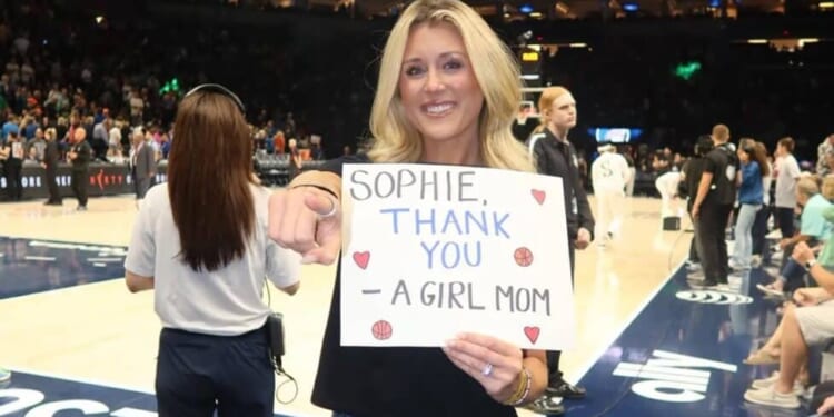 Riley Gaines Told to Lower Sophie Cunningham Sign