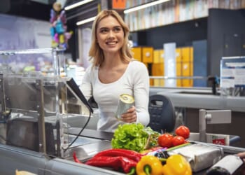 Image for article: Teenage Cashier Desperately Hoping Middle-Aged Man Will Start Up Small Talk With Her