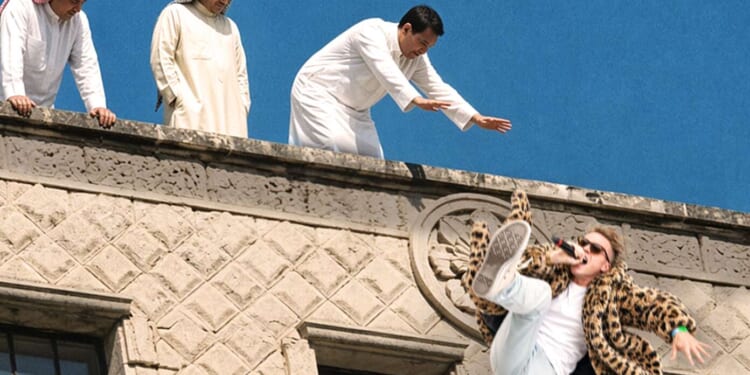 Image for article: Macklemore Performs Concert In Gaza And Oh No! They've Thrown Him Off A Roof
