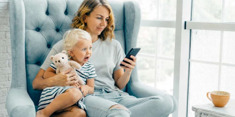 Image for article: Toddler Puts Self Up For Adoption After Seeing Mom Scrolling Lindsay Clancy TikTok